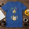 Treble Maker t-shirt design with a yellow electric guitar, sunflowers, and sound waves