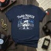 Treble MAKER # MAKER t-shirt design featuring a cartoon musical note character conducting with city skyline background and musical notes