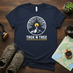 Trek N Tree t-shirt with a graphic of a person on a mountain peak under a stylized tree and sun