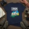 Trek Rwanda t-shirt design featuring white gorillas walking on green mountains, with the Rwanda flag colors in the background