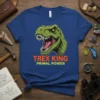 Trex King Primal Power t-shirt with a green T-Rex head graphic and bold orange and yellow text