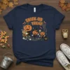 Retro Halloween Trick Or Treat Spooky Stuff t-shirt design with three smiling pumpkins, candy bag, and spooky elements.|