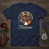Tristane cat portrait design on a navy blue t-shirt, featuring a stylized cat face with orange and black markings and