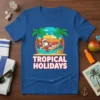 Tropical Holidays graphic t-shirt with Santa in a hammock on a beach, wearing sunglasses and holding a drink