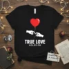 Black t-shirt with "TRUE LOVE HOLDS ON" text and graphic of two hands holding a red heart balloon string