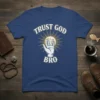Trust God Bro t-shirt with hand and halo graphic, featuring bold white text
