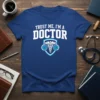 Trust Me I'm A Doctor T-Shirt featuring bold white text and a caduceus symbol with brain graphics