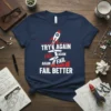 Motivational T-Shirt with "Try Again Fail Again Fail Better" text and a rocket graphic