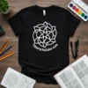 Black t-shirt featuring a white intricate mandala design and the text TShirtsToColor.com, promoting creative coloring