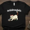Turkishvanaholic t-shirt design featuring a cream-colored cat with blue and green eyes eating from a bowl, with the word 'turkishvanaholic'