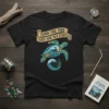 Turn The Tide Save The Sea Turtles quote on a black t-shirt with a sea turtle graphic and ocean waves
