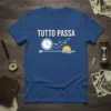 TUTTO PASSA Italian phrase t-shirt with a graphic of a clock, birds, and a sunset on a blue shirt
