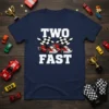 Navy t-shirt with white text "TWO FAST" and graphics of two red go-karts and checkered flags