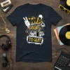 Two Legit To Quit text graphic with boombox, microphone, and vinyl records on a dark t-shirt