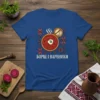 Blue t-shirt featuring the text "БОРЩ І ВАРЕНИКИ" above a stylized illustration of borscht soup and varenyky, with Ukrainian folk