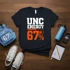 UNC Energy 67% text graphic on a navy t-shirt, featuring a progress bar and battery icon
