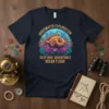 Navy t-shirt featuring "Underwater Exploration Deep Dive Adventures Ocean Floor" text with a colorful fish graphic and coral reef illustration