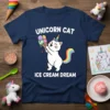 White unicorn cat with rainbow tail eating ice cream, text UNICORN CAT ICE CREAM DREAM on navy t-shirt