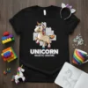 Black t-shirt with "UNICORN MAJESTIC CREATURE" text and a building block style unicorn graphic