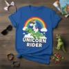 Unicorn Rider text with a cartoon unicorn riding a dinosaur under a rainbow on a blue t-shirt