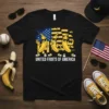 United Fruits Of America text with three cartoon bananas in sunglasses and patriotic American flag design on a black t-shirt