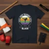 Black t-shirt with "Untite Keep Training Untithe Black" text, featuring a silhouette of a karate practitioner kicking within a circular