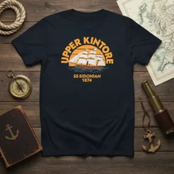 Navy t-shirt featuring "UPPER KINTORE SS SIDONIAN 1874" text with a vintage sailing ship graphic at sunset