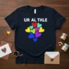 Navy blue t-shirt with white text "UR AL THLE" and a cluster of colorful hearts below