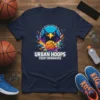 Urban Hoops Court Dominance t-shirt with a blue eagle and basketball graphic, bold white text