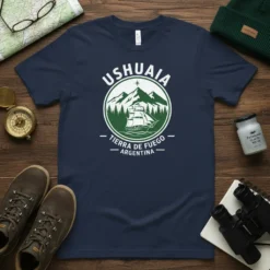 Ushuaia Tierra de Fuego Argentina travel t-shirt design with mountains, sailboat, and trees in a circle