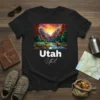 Utah State Landscape T-Shirt featuring deer in a mountain valley at sunset, with "Utah" text