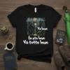 Italian phrase "Va bene Lo sto bene Va tutto bene" on a black t-shirt with a dandelion in the rain