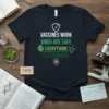 T-shirt with text "Vaccines Work GMOs Are Safe Everything Is A Chemical" in green and white, featuring science icons like