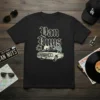 Van Nuys text and classic car graphic on a black t-shirt, representing California style