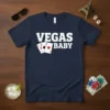 VEGAS BABY t-shirt with playing cards graphic, bold white text, navy blue shirt