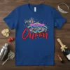 Vegas's Welcome To The Birthday Queen text design with neon signs and confetti on a blue t-shirt
