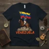 Venezuela T-Shirt with a historical figure on horseback holding the Venezuelan flag and the word VENEZUELA below