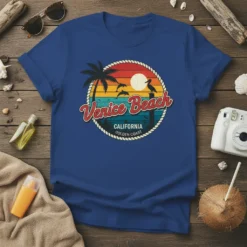 Venice Beach California Golden Coast retro t-shirt design with palm trees, pelican, dolphins, and sunset