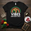 Juneteenth t-shirt with "Vibes Juneteenth Only" text and a raised fist graphic within a Pan-African colored rainbow