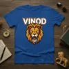 VINOD text above a roaring lion head graphic on a blue t-shirt
