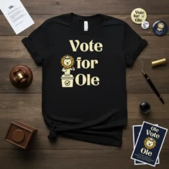 Black t-shirt with "Vote for Ole" text and a lion in a ballot box graphic, promoting election support