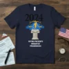 Navy t-shirt with "2024 VOTING PREVENTS UNWANTED PRESIDENCIES" text, scales of justice, lightning bolt, and column graphic