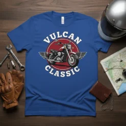 VULCAN CLASSIC text with a vintage motorcycle graphic and wings on a blue t-shirt