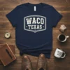 Navy blue t-shirt featuring "WACO TEXAS" in a vintage shield design with stars