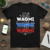 Black t-shirt with "WAGMI WAGMI WAGMI" repeated in white, blue, and red text, featuring circuit board graphics and crypto symbols