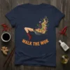 Walk The Wok t-shirt design featuring a person's legs in a boot emerging from a wok filled with noodles and