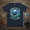 Wanderlust Adventures Explore The Unknown whale graphic t-shirt with mountains and moon