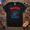Wanna Bang? t-shirt design with a blue cannon, red and blue fireworks, and stars. Patriotic 4th of July graphic