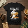 Wanna Bee Apiarist t-shirt design featuring a beekeeper in a suit inspecting a honeycomb with bees flying around