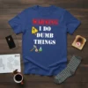 Warning I Do Dumb Things T-Shirt with a yellow hazard sign and beaker graphic